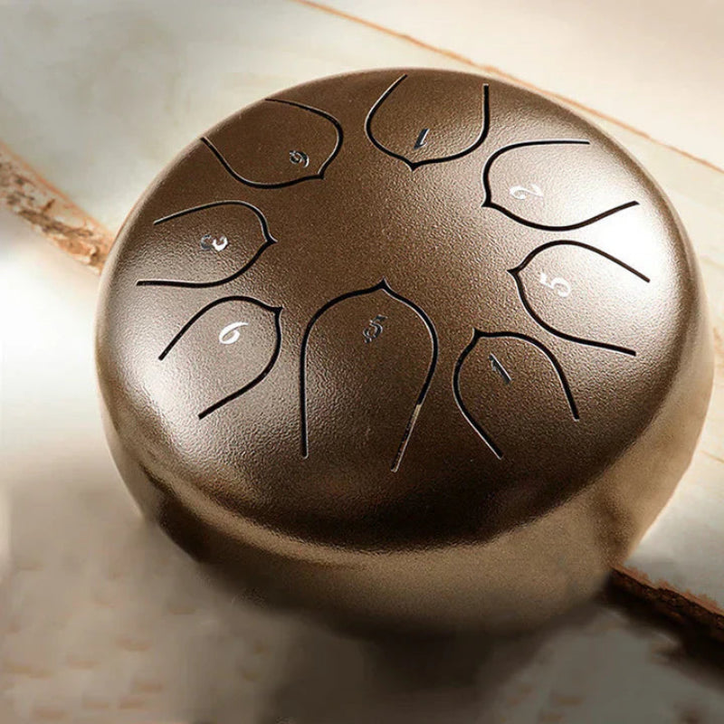 Mini avslappnande trumma med integrerade lugnande ljud 